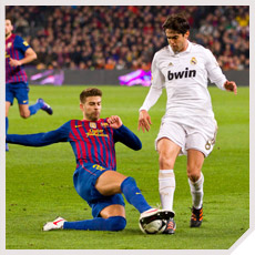 Pique Taking Kaka and Ball
